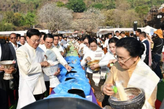 President joins almsgiving at Vat Phou Festival 